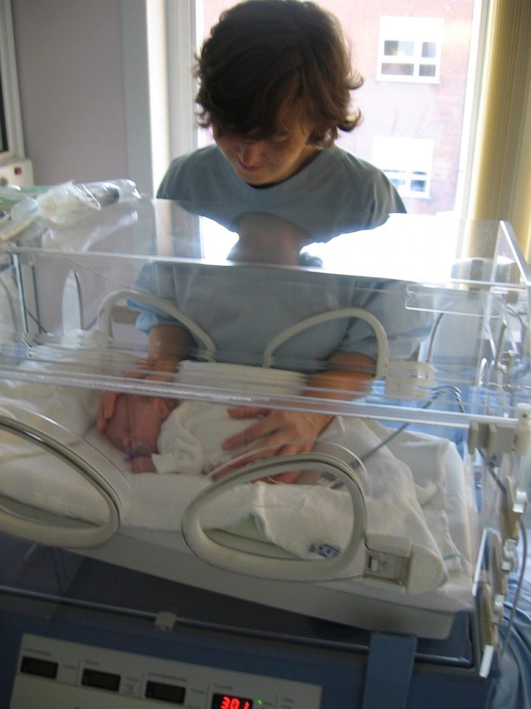 A newborn baby sleeping peacefully