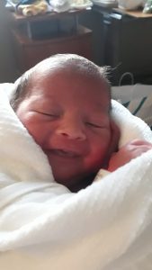 Elias snug in his swaddle sleep sack